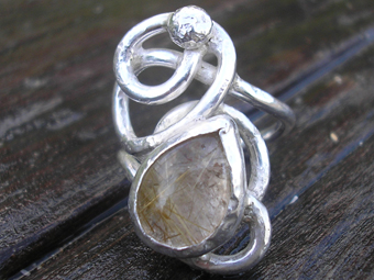 Silver and rutilated quartz ring