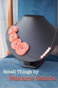 Light coral pink felt and floral tensha beads are the ingredients for this funny necklace.